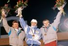 Finland's Matti Nykanen, centre, gold medal winner in the 70m ski jump is flanked by Czech's Pavel Ploc, left, silver, and Jiri Malec, bronze, at the Winter Olympics in Calgary on Feb. 14, 1988. (AP Photo)