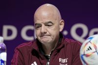 FIFA President Gianni Infantino meets the media at a press conference of the FIFA referees at the World Cup media center in Doha, Qatar, Friday, Nov. 18, 2022.(AP Photo/Martin Meissner)