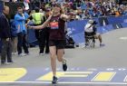 Kathrine Switzer, who was the first official woman entrant in the Boston Marathon 50 years ago, crosses the finish line in the Boston Marathon, Monday, April 17, 2017, in Boston. (AP Photo/Elise Amendola)