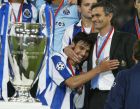 GELSENKIRCHEN, GERMANY - MAY 26: Nuno Valente of FC Porto hugs his manager Jose Dos Santos Mourinho after winning the Champions League during the UEFA Champions League Final match between AS Monaco and FC Porto at the AufSchake Arena on May 26, 2004 in Gelsenkirchen, Germany. (Photo by Alex Livesey/Getty Images)
