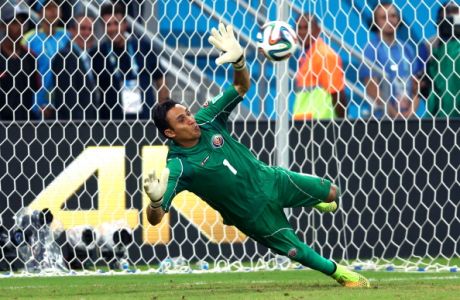 RECIFE, BRAZIL - JUNE 29: Keylor Navas of Costa Rica saves a penalty kick by Theofanis Gekas of Greece (not pictured) during the 2014 FIFA World Cup Brazil Round of 16 match between Costa Rica and Greece at Arena Pernambuco on June 29, 2014 in Recife, Brazil.  (Photo by Jeff Gross/Getty Images)