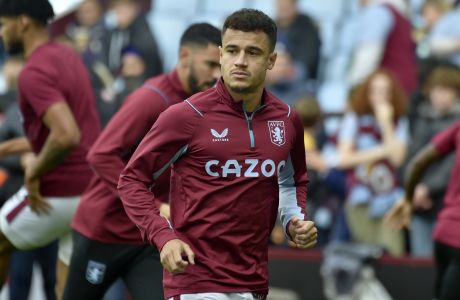 Aston Villa's Philippe Coutinho exercises during warmup before the English Premier League soccer match between Aston Villa and Brentford at Villa Park in Birmingham, England, Sunday, Oct. 23, 2022. (AP Photo/Rui Vieira)