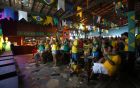 PORTO SEGURO, BRAZIL - JUNE 12:  Brazil fans cheer their team during the Group A match between Brazil and Croatia on June 12, 2014 in Porto Seguro, Brazil.  (Photo by Martin Rose/Getty Images)