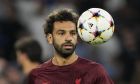 Liverpool's Mohamed Salah warms up before the group A Champions League soccer match between Napoli and Liverpool at the Diego Armando Maradona stadium in Naples, Italy, Wednesday, Sept. 7, 2022. (AP Photo/Andrew Medichini)