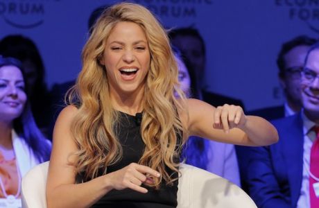 Colombian singer Shakira gestures during a panel at the World Economic Forum in Davos, Switzerland, Tuesday, Jan. 17, 2017. (AP Photo/Michel Euler)