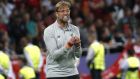 Liverpool coach Jurgen Klopp gestures during the Champions League Final soccer match between Real Madrid and Liverpool at the Olimpiyskiy Stadium in Kiev, Ukraine, Saturday, May 26, 2018. (AP Photo/Pavel Golovkin)