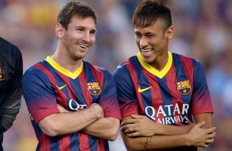 FC Barcelona's Lionel Messi, from Argentina, left, and Neymar, from Brazil, smile prior to the Joan Gamper trophy match against Santos at the Camp Nou in Barcelona, Spain, Friday, Aug. 2, 2013. (AP Photo/Manu Fernandez)
