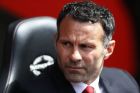 Manchester United's interim manager Ryan Giggs looks on from the dugout before the start of their English Premier League soccer match against Southampton at St Mary's stadium, Southampton, England, Sunday, May 11, 2014. (AP Photo/Sang Tan)