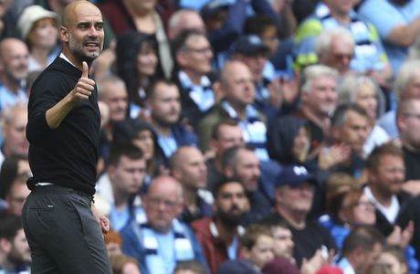 Manchester City manager Pep Guardiola during the English Premier League soccer match between Manchester City and Huddersfield Town at the Etihad Stadium in Manchester, England, Sunday, Aug. 19, 2018. (AP Photo/Dave Thompson)