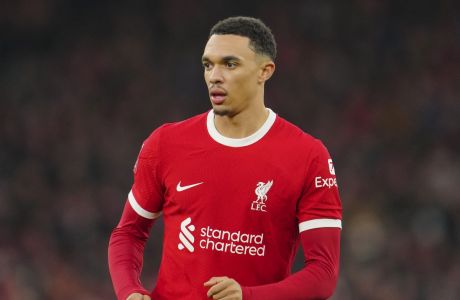 Liverpool's Trent Alexander-Arnold runs during the English FA Cup fourth round soccer match between Liverpool and Norwich, at Anfield stadium in Liverpool, England, Sunday, Jan. 28, 2024. (AP Photo/Jon Super)