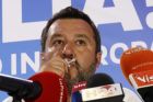 Italian Interior Minister and Deputy Premier Matteo Salvini, of the League, kisses a crucifix as he talks to reporters during a press conference at the League headquarters in Milan, Italy, early Monday morning, May 27, 2019. Italy's anti-migrant, anti-Islam interior minister, Matteo Salvini, boosted his right-wing League party to become the No. 1 party in Italy, with more than 30 percent of the vote, according to early projections. (AP Photo/Antonio Calanni)