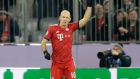 Bayern midfielder Arjen Robben celebrates after scoring the opening goal during the Champions League group E soccer match between FC Bayern Munich and Benfica Lisbon in Munich, Germany, Tuesday, Nov. 27, 2018. (AP Photo/Matthias Schrader)