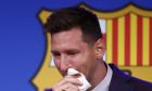 Lionel Messi cries at the start of a press conference at the Camp Nou stadium in Barcelona, Spain, Sunday, Aug. 8, 2021. FC Barcelona had previously announced the negotiations with Lionel Messi had ended and that Messi would be leaving the club. (AP Photo/Joan Monfort)