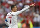 Portugal's Cristiano Ronaldo celebrates after scoring the opening goal during the group B match between Portugal and Morocco at the 2018 soccer World Cup in the Luzhniki Stadium in Moscow, Russia, Wednesday, June 20, 2018. (AP Photo/Francisco Seco)