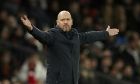Manchester United's head coach Erik ten Hag gestures as he stands on the touchline during the English League Cup semifinal second leg soccer match between Manchester United and Nottingham Forest at Old Trafford in Manchester, England, Wednesday, Feb. 1, 2023. (AP Photo/Dave Thompson)