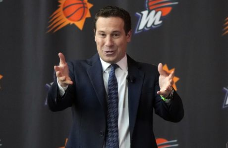 Mat Ishbia, new controlling interest owner of the Phoenix Suns and Phoenix Mercury, talks to the media during a basketball news conference, Wednesday, Feb. 8, 2023, in Phoenix. (AP Photo/Rick Scuteri)