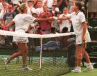 Slovakia's Katarina Studenikova (left), shakes hands with Monica Seles, after their Women's Singles, second round match on Wimbledon's Number One Court, Thursday June 26, 1996. Studenikova pulled off a shock 7-5, 5-7, 6-4 victory over Seles, who was seeded number two.(AP Photo/Gill Allen)