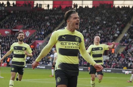 Manchester City's Jack Grealish celebrates after scoring his side's second goal during the English Premier League soccer match between Southampton and Manchester City at St Mary's Stadium in Southampton, England, Saturday, April 8, 2023. (AP Photo/Frank Augstein)