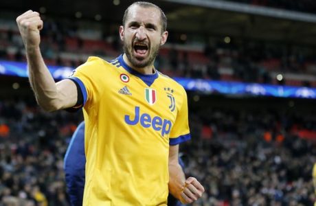 Juventus' Giorgio Chiellini celebrates at the end of a the Champions League, round of 16, second-leg soccer match between Juventus and Tottenham Hotspur, at the Wembley Stadium in London, Wednesday, March 7, 2018. Juventus won 2-1. (AP Photo/Frank Augstein))