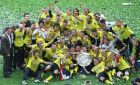 DORTMUND, GERMANY - MAY 14: Player of Dortmund celebrate with the trophy winning the German Championship after the Bundesliga match between Borussia Dortmund and Eintracht Frankfurt at Signal Iduna Park on May 14, 2011 in Dortmund, Germany.  (Photo by Nadine Rupp/Bongarts/Getty Images)