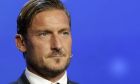 FILE - In this Aug. 24, 2017 file photo, former Italian player Francesco Totti is seen at the UEFA Champions League draw at the Grimaldi Forum, in Monaco. Retired Roma captain Francesco Totti says he struggled with pneumonia after contracting COVID-19. Totti writes on Instagram that he has recovered after 15 long days of medical care at home. The 44-year-old Totti says he struggled to get a fever to subside and lost strength. Tottis father died last month from the coronavirus at age 76. (AP Photo/Claude Paris)