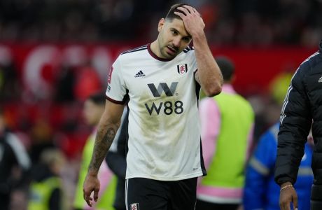Fulham's Aleksandar Mitrovic reacts after he was shown a red card during the English FA Cup quarterfinal soccer match between Manchester United and Fulham at the Old Trafford stadium in Manchester, England, Sunday, March 19, 2023. (AP Photo/Jon Super)