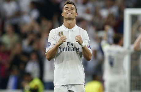 Real Madrid's Cristiano Ronaldo celebrates at the end of the match after the Champions League semifinal first leg soccer match between Real Madrid and Atletico Madrid at the Santiago Bernabeu stadium in Madrid, Spain, Tuesday, May 2, 2017. (AP Photo/Francisco Seco)