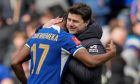 Chelsea manager Mauricio Pochettino celebrates at full time with Goalscorer Carney Chukwuemeka during the FA Cup 6th Round Soccer Match between Chelsea and Leicester City played at Stamford Bridge, London, England,Sunday,March 17,2024. (AP Photo/Dave Shopland)