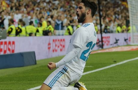 Real Madrid's Isco celebrates after scoring his second goal during a Spanish La Liga soccer match between Real Madrid and Espanyol at the Santiago Bernabeu stadium in Madrid, Spain, Sunday, Oct. 1, 2017. (AP Photo/Paul White)