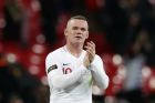 England's Wayne Rooney greets fans after his 120th cap, the international friendly soccer match between England and the United States at Wembley stadium, Thursday, Nov. 15, 2018. (AP Photo/Alastair Grant)