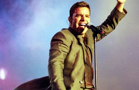 FILE - In this June 26, 1998 file photo, Puerto Rican pop star Ricky Martin performs at the Presidente Latin Music Festival held in national stadium in, Santo Domingo, Dominican Republic. (AP Photo/John Riley, file)