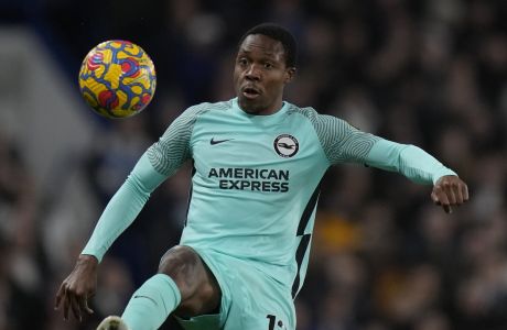 Brighton's Enock Mwepu controls the ball during the English Premier League soccer match between Chelsea and Brighton and Hove Albion at Stamford Bridge in London, Wednesday, Dec. 29, 2021. (AP Photo/Alastair Grant)