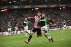 Sassuolo's Pol Lirola duels for the ball with Athletic Bilbao's Aritz Aduriz, left, during the Europa League Group F soccer match between Athletic Bilbao and Sassuolo, at the San Mames stadium, in Bilbao, northern Spain, Thursday, Nov. 24, 2016. Athletic Bilbao won the match 3-2. (AP Photo/Alvaro Barrientos)