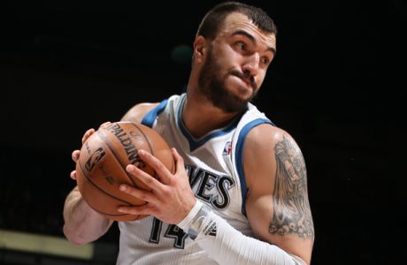 MINNEAPOLIS, MN - FEBRUARY 1: Nikola Pekovic #14 of the Minnesota Timberwolves grabs a rebound against the Los Angeles Lakers during the game on February 1, 2013 at Target Center in Minneapolis, Minnesota. NOTE TO USER: User expressly acknowledges and agrees that, by downloading and or using this Photograph, user is consenting to the terms and conditions of the Getty Images License Agreement. Mandatory Copyright Notice: Copyright 2013 NBAE (Photo by David Sherman/NBAE via Getty Images)