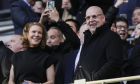 Manchester United's Chairman Avie Glazer, right, and Newcastle's Club Director Amanda Staveley, left, smile before English League Cup final soccer match between Manchester United and Newcastle United at Wembley Stadium in London, Sunday, Feb. 26, 2023. (AP Photo/Alastair Grant)