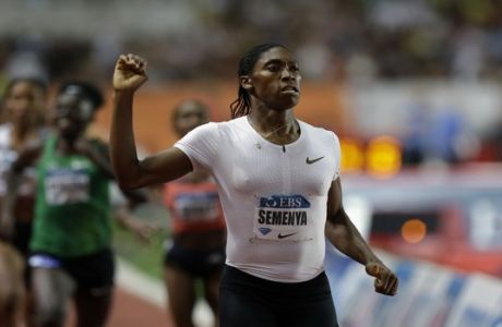 Caster Semenya of South Africa celebrates after winning the women's 800m race during the IAAF Diamond League Athletics meeting at the Louis II Stadium in Monaco, Friday, July 20, 2018. (AP Photo/Claude Paris)