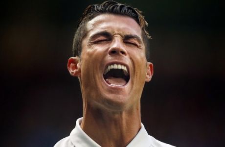 Real Madrid's Cristiano Ronaldo from Portugal reacts during a Spain's La Liga soccer match between Real Madrid and Alaves at the Santiago Bernabeu stadium in Madrid, Spain, Sunday, April 2, 2017. (AP Photo/Daniel Ochoa de Olza)