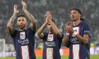 PSG's Sergio Ramos, left, PSG's Hugo Ekitike, right, and PSG's Achraf Hakimi applaud fans at the end of the Champions League group H soccer match between Juventus and Paris Saint Germain at the Allianz stadium in Turin, Italy, Wednesday, Nov. 2, 2022. (AP Photo/Antonio Calanni)