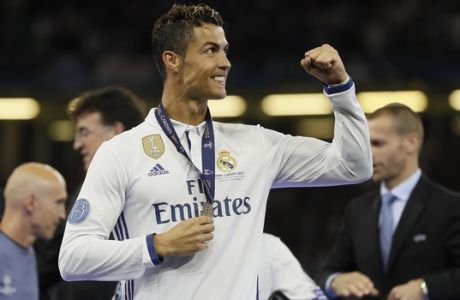 Real Madrid's Cristiano Ronaldo celebrates at the end of the Champions League soccer final between Juventus and Real Madrid at the Millennium Stadium in Cardiff, Wales, Saturday, June 3, 2017. (AP Photo/Kirsty Wigglesworth)