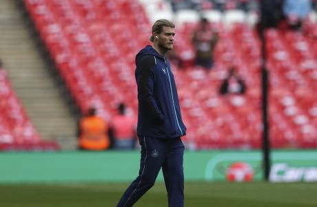 Newcastle's goalkeeper Loris Karius checks the field ahead of the English League Cup final soccer match between Manchester United and Newcastle United at Wembley Stadium in London, Sunday, Feb. 26, 2023. (AP Photo/Scott Heppell)