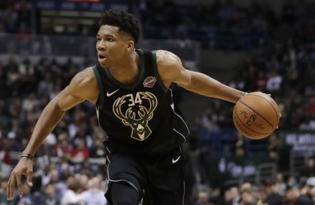 Milwaukee Bucks' Giannis Antetokounmpo drives during the second half of an NBA basketball game against the Houston Rockets Wednesday, March 7, 2018, in Milwaukee. (AP Photo/Morry Gash)