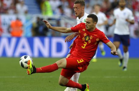 England's Jamie Vardy vies for the ball with Belgium's Thomas Vermaelen, right, during the group G match between England and Belgium at the 2018 soccer World Cup in the Kaliningrad Stadium in Kaliningrad, Russia, Thursday, June 28, 2018. (AP Photo/Alastair Grant)