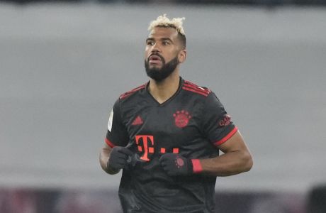 Bayern's Eric Maxim Choupo-Moting celebrates after scoring his side's first goal during the German Bundesliga soccer match between RB Leipzig and FC Bayern Munich at the Red Bull Arena in Leipzig, Germany, Jan. 20, 2023. (AP Photo/Matthias Schrader)