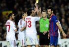 Referee's Bjorn Kuipers, second right, shows a yellow card to AC Milan's Alessandro Nesta, third right, during 2nd leg, quarterfinal Champions League soccer match at the Camp Nou against FC Barcelona in Barcelona, Spain, Tuesday, April 3, 2012. (AP Photo/Manu Fernandez)