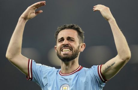 Manchester City's Bernardo Silva celebrates after teammate Rodrigo scored the opening goal during the Champions League final soccer match between Manchester City and Inter Milan at the Ataturk Olympic Stadium in Istanbul, Turkey, Saturday, June 10, 2023. (AP Photo/Francisco Seco)