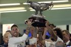 Real Madrid's Sergio Ramos, left, and teammate Marcelo hold up the trophy after winning the Santiago Bernabeu trophy soccer match between Real Madrid and AC Milan at the Santiago Bernabeu stadium, in Madrid, Saturday, Aug. 11, 2018. (AP Photo/Andrea Comas)