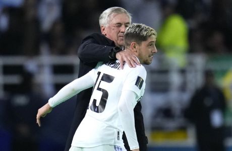 Real Madrid's Federico Valverde celebrates after scoring his side's 2nd goal with Real Madrid head coach Carlo Ancelotti during the FIFA Club World Cup final match between Real Madrid and Al Hilal at Prince Moulay Abdellah stadium in Rabat, Morocco, Saturday, Feb. 11, 2023. (AP Photo/Manu Fernandez)