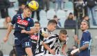 Napoli's Christian Maggio (L) and teammate Valon Beherami (R) fight for the the ball against Siena' Emanuele Calaio (2nd L) and Matteo Rubin (2nd R) during their serie A football match at Artemio Franchi stadium in Siena on December 22, 2012. AFP PHOTO / FABIO MUZZI
