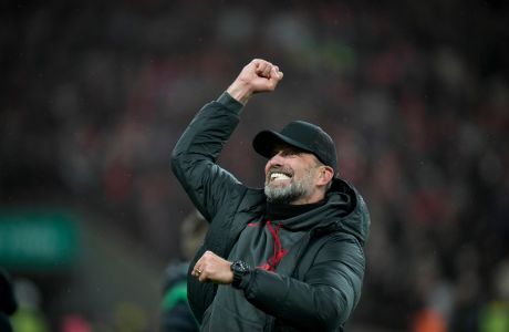 Liverpool's manager Jurgen Klopp celebrates after his team won the English League Cup final soccer match between Chelsea and Liverpool at Wembley Stadium in London, Sunday, Feb. 25, 2024. (AP Photo/Alastair Grant)