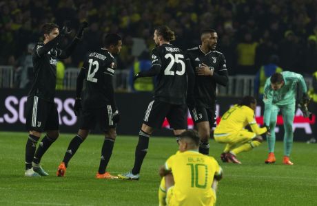 Juventus players celebrate after the Europa League play-off second leg soccer match between Nantes and Juventus at the La Beaujoire stadium, Thursday, Feb.23, 2023 in Nantes, western France. Juventus won 3-0. (AP Photo/Mathieu Pattier)